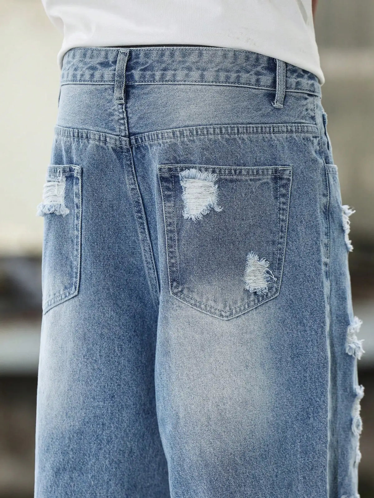 Calça Harém jeans rasgada azul masculina para primavera e outono. Moda de rua. Tendência Casual 。