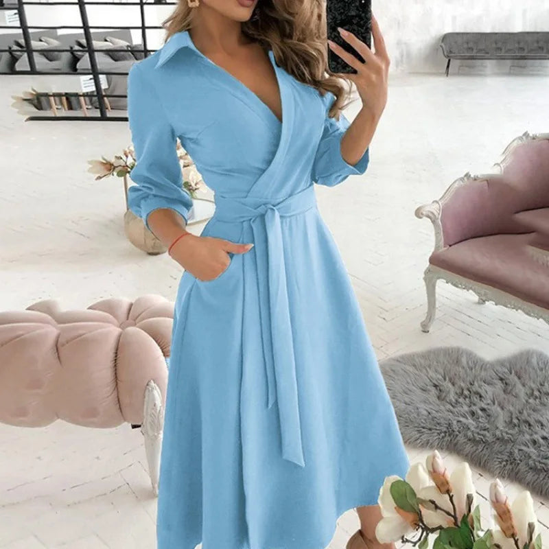Novo vestido longo feminino de outono com estampa geométrica, decote em V, estilo camisa color block, com laço na lapela e barra assimétrica.