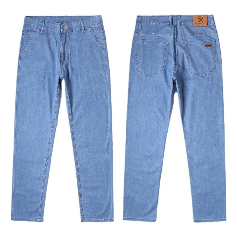 Calça Masculina Casual de Verão – Tecido Leve, Cintura Alta, Jeans de Algodão com Elastano, Lavagem Efeito "Ice Silk", Corte Reto e Solto