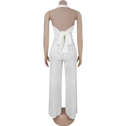 Conjunto feminino casual de duas peças: blusa frente única com amarração, botões e cor sólida + calça soltinha (tendência de verão)