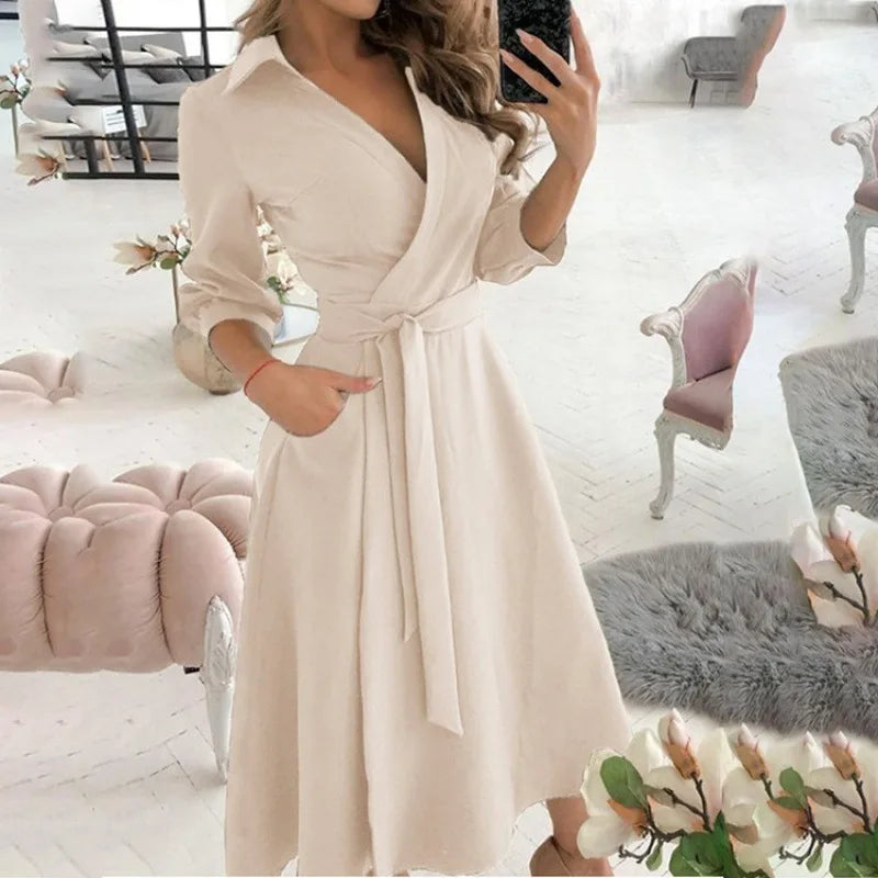 Novo vestido longo feminino de outono com estampa geométrica, decote em V, estilo camisa color block, com laço na lapela e barra assimétrica.