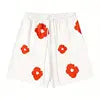 Conjunto Masculino de 2 Peças (Camiseta e Shorts) em Jeans com Estampa de Guirlanda em Relevo (3D Puff) e Detalhes Rasgados – Estilo Streetwear Americano (100% Algodão)