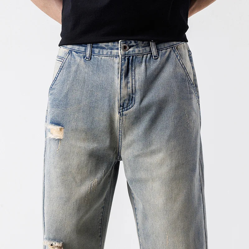 Jeans estilo europeu e americano com rasgos e visual vintage — modelo casual e folgado (baggy) — pronta-entrega.
