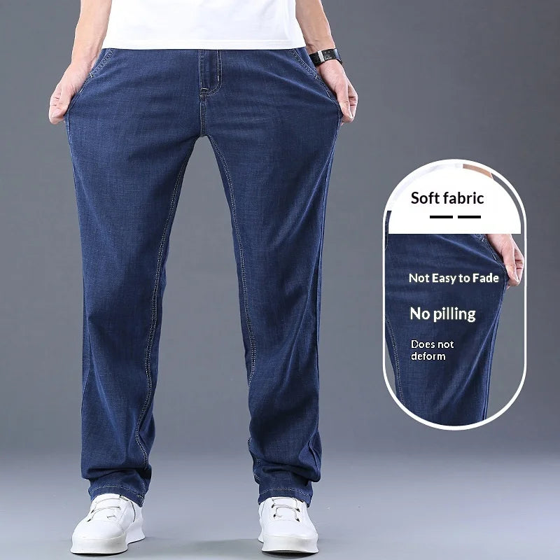 Calça Masculina Casual de Verão – Tecido Leve, Cintura Alta, Jeans de Algodão com Elastano, Lavagem Efeito "Ice Silk", Corte Reto e Solto