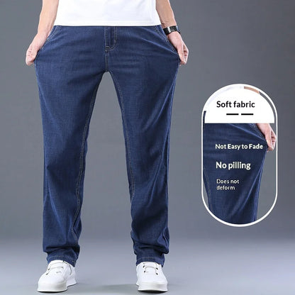 Calça Masculina Casual de Verão – Tecido Leve, Cintura Alta, Jeans de Algodão com Elastano, Lavagem Efeito "Ice Silk", Corte Reto e Solto