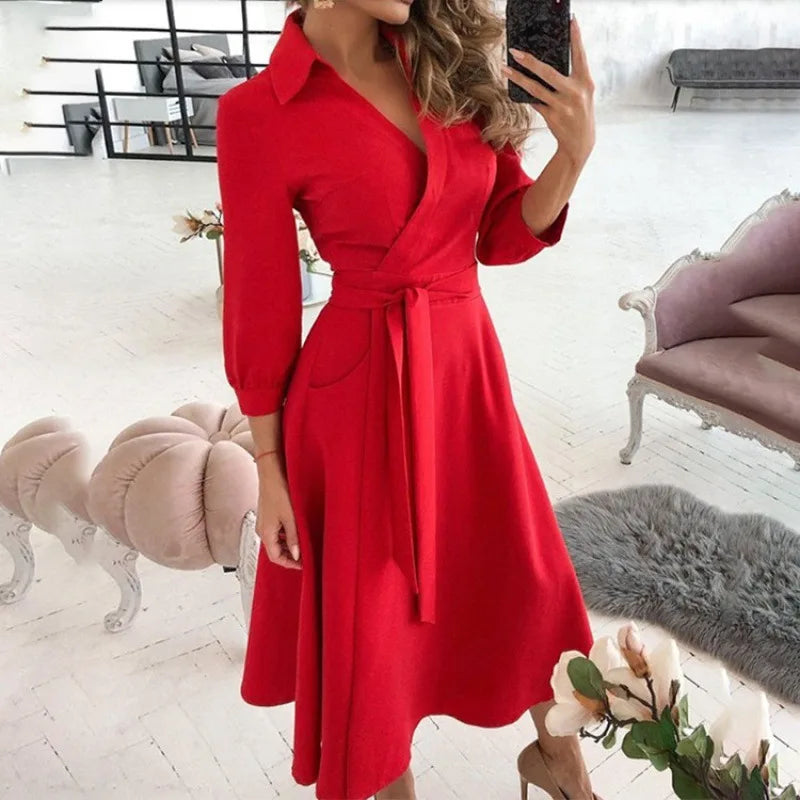 Novo vestido longo feminino de outono com estampa geométrica, decote em V, estilo camisa color block, com laço na lapela e barra assimétrica.