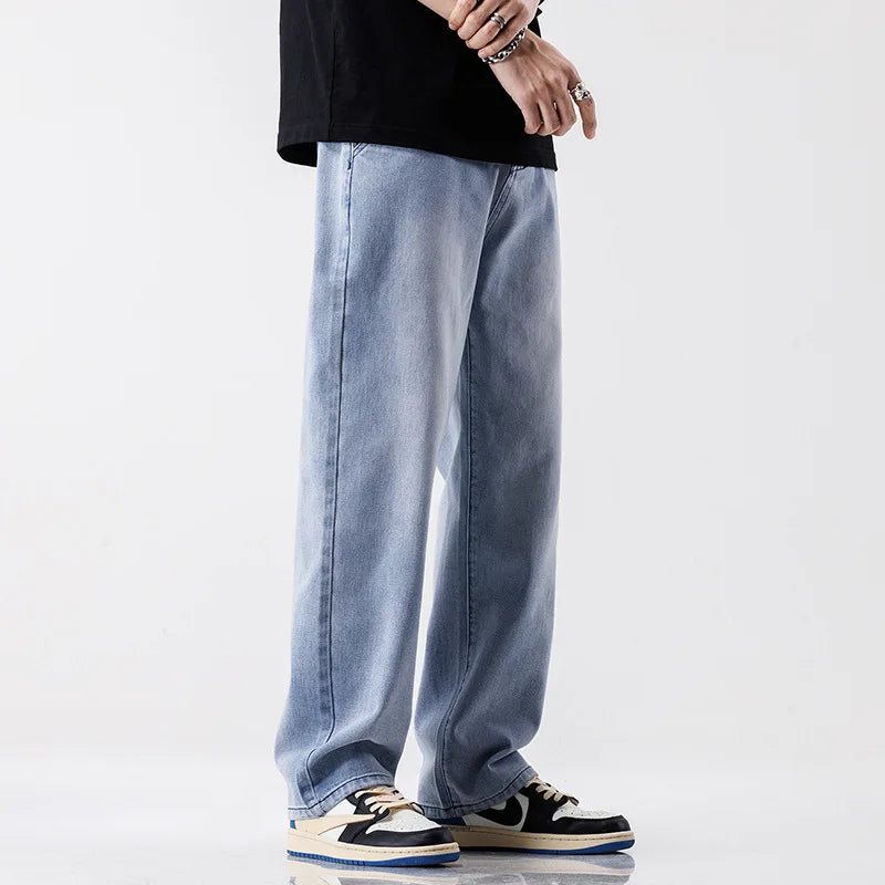 Jeans estilo europeu e americano com rasgos e visual vintage — modelo casual e folgado (baggy) — pronta-entrega.
