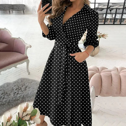 Novo vestido longo feminino de outono com estampa geométrica, decote em V, estilo camisa color block, com laço na lapela e barra assimétrica.