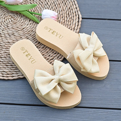 Sandálias femininas elegantes com plataforma e laço, perfeitas para férias no verão de 2026. Confortáveis, com sola macia em EVA, modelo slip-on e elástico.