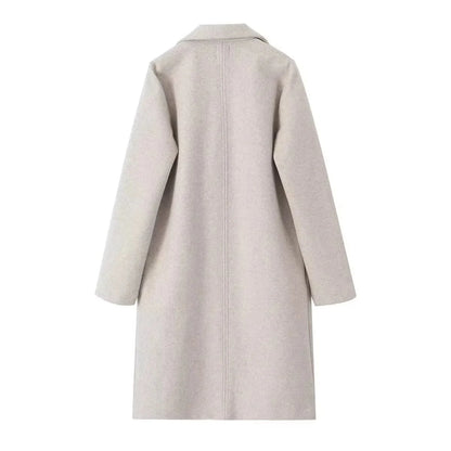 Casaco feminino de lã, modelo trench coat longo, liso, com costura aberta, decote em V vintage e mangas compridas. Ideal para um look feminino elegante.