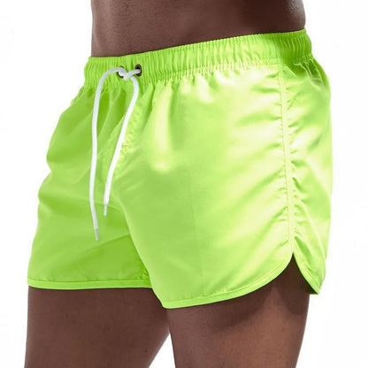 Calções de banho masculinos para o verão, calções de banho de marca, calções de banho sensuais, fatos de banho masculinos de cintura baixa e respiráveis para a praia.