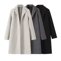 Casaco feminino de lã, modelo trench coat longo, liso, com costura aberta, decote em V vintage e mangas compridas. Ideal para um look feminino elegante.