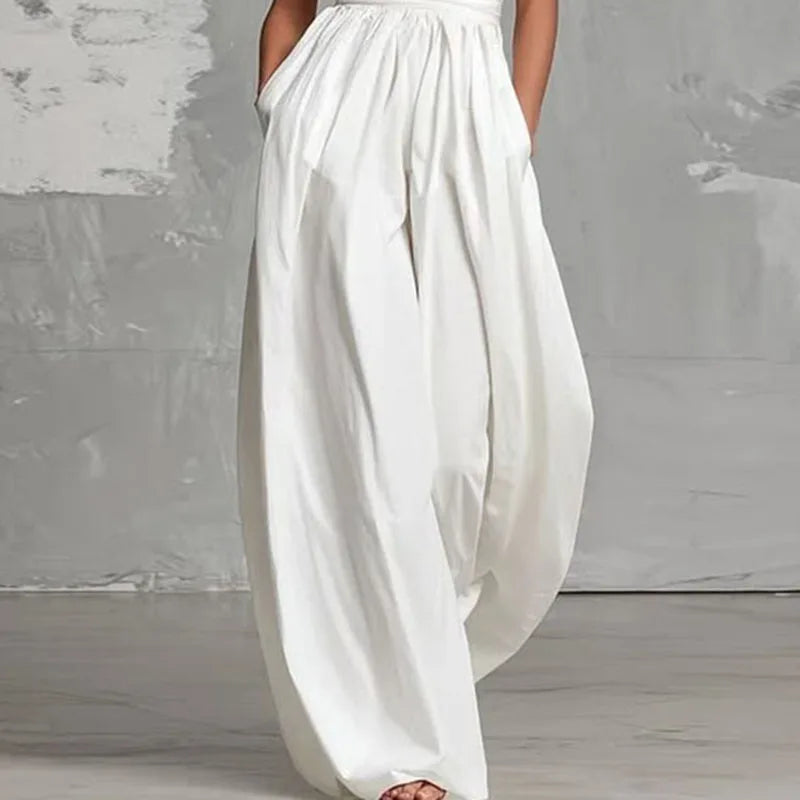 Macacão Feminino Novo de Primavera com Decote Halter, Renda Vazada, Cintura Alta, Sem Mangas, Bolsos e Pernas Largas - Perfeito para o Verão