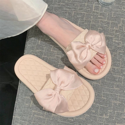 Sandálias de praia femininas de verão, modelo slip-on, com sola plana, antiderrapantes, em PVC com nó, respiráveis e confortáveis para uso em casa.