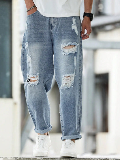 Calça Harém jeans rasgada azul masculina para primavera e outono. Moda de rua. Tendência Casual 。