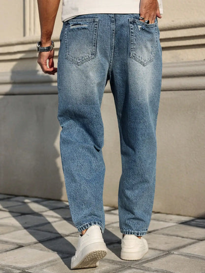 Jeans rasgados azuis masculinos, calças de mendigo retrô desgastadas, calças harém soltas de tendência de rua