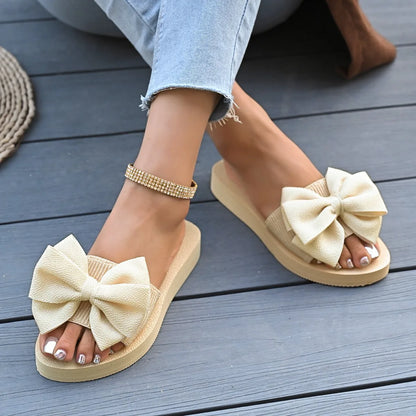 Sandálias femininas elegantes com plataforma e laço, perfeitas para férias no verão de 2026. Confortáveis, com sola macia em EVA, modelo slip-on e elástico.