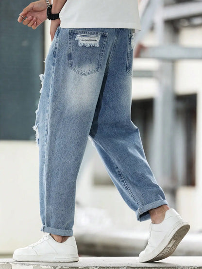 Calça Harém jeans rasgada azul masculina para primavera e outono. Moda de rua. Tendência Casual 。