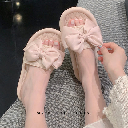 Sandálias de praia femininas de verão, modelo slip-on, com sola plana, antiderrapantes, em PVC com nó, respiráveis e confortáveis para uso em casa.