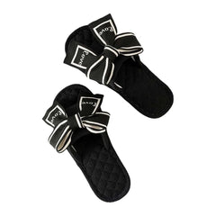 Chinelo de chão com laço Love Bow, plataforma plana e silenciosa, em tecido macio, para uso interno, ideal para mulheres.