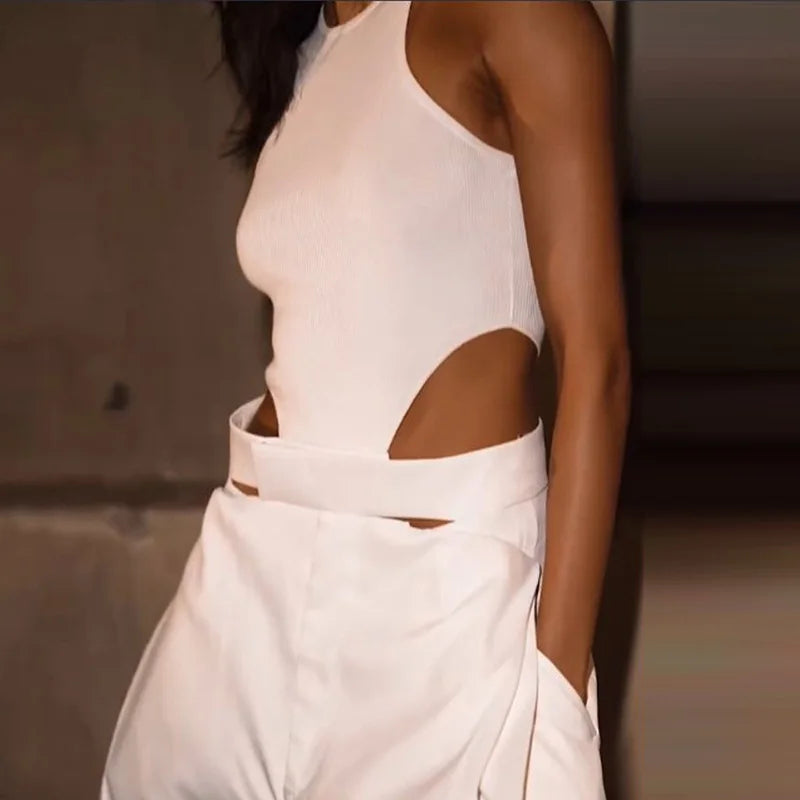 Estilo de design chique oco para fora macacões brancos sexy magro cintura alta perna larga playsuits elegante o colarinho sem mangas bolso macacão