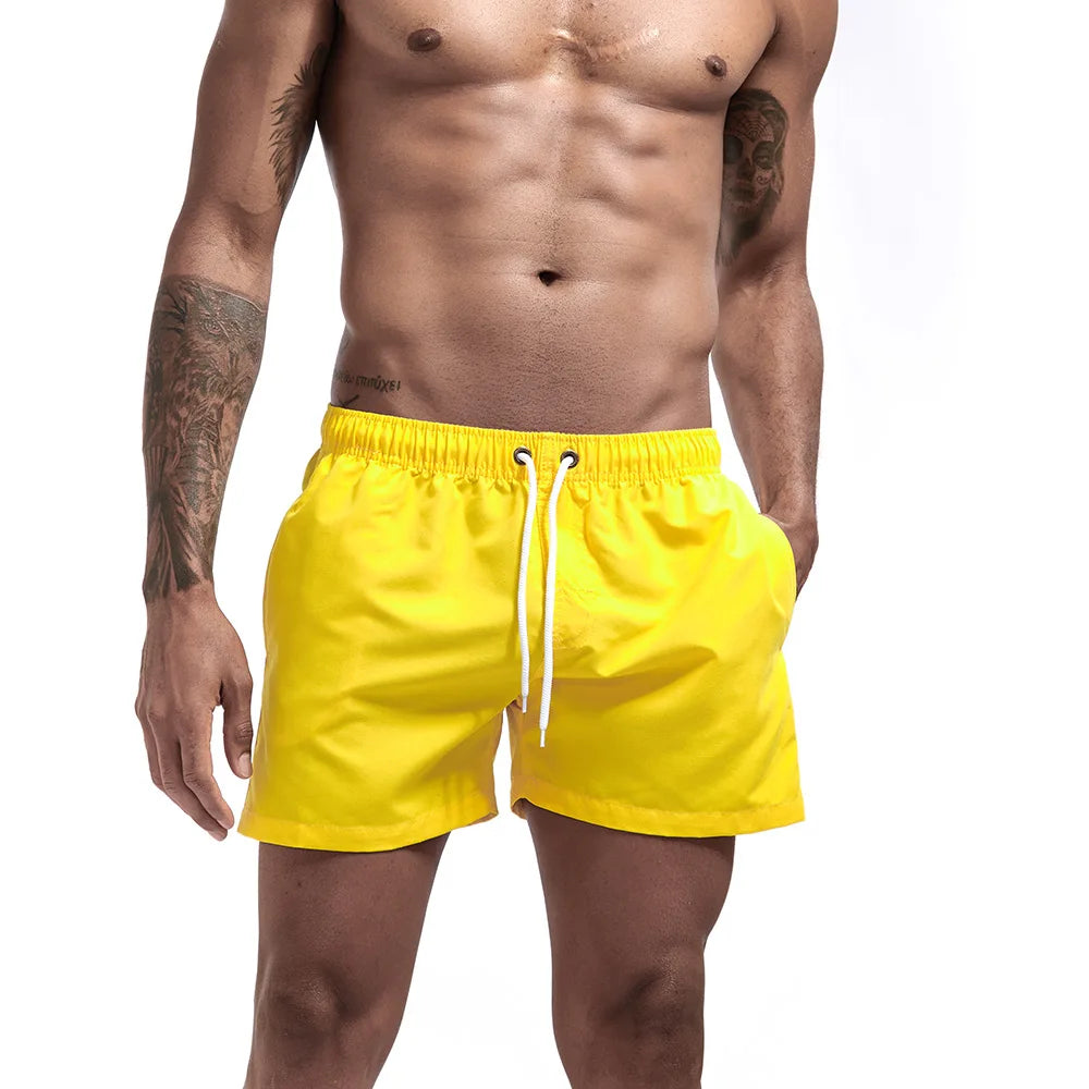 Calções de banho masculinos para praia, calções de banho para ginástica e corrida, calções de banho para homem.
