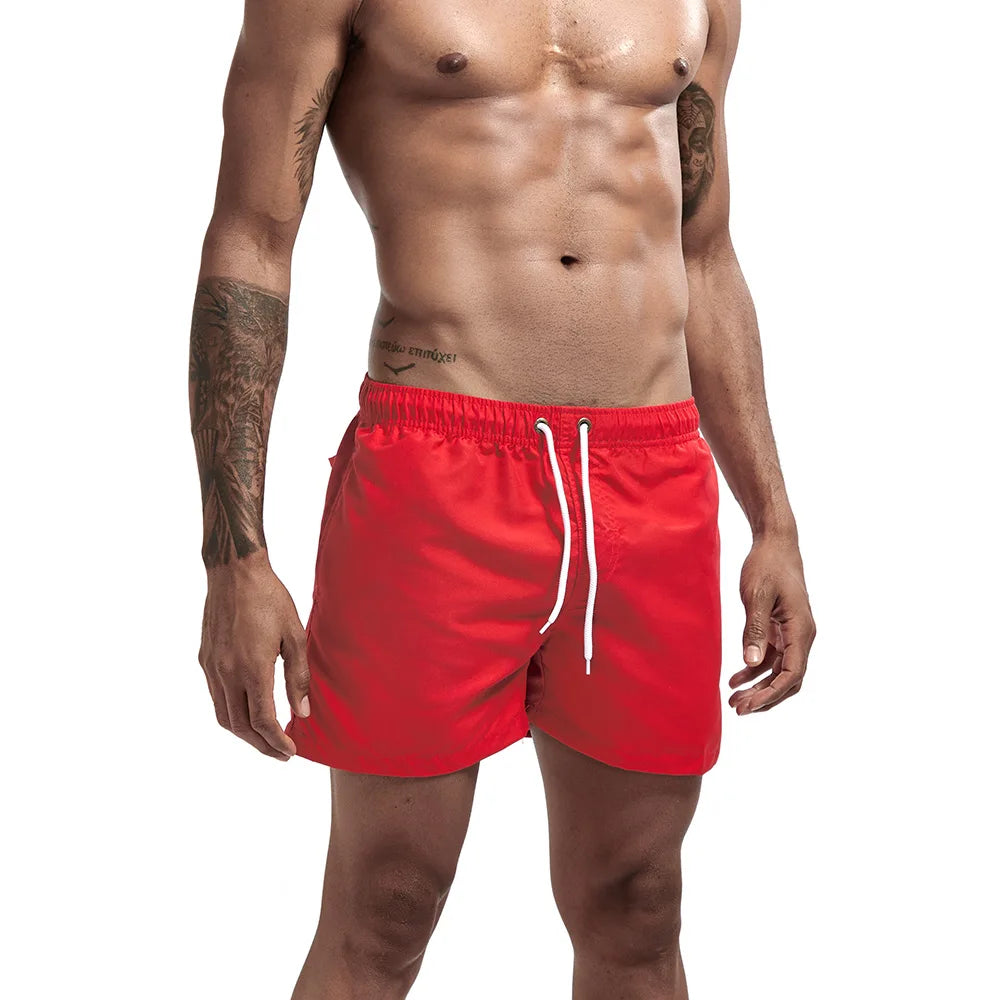 Calções de banho masculinos para praia, calções de banho para ginástica e corrida, calções de banho para homem.