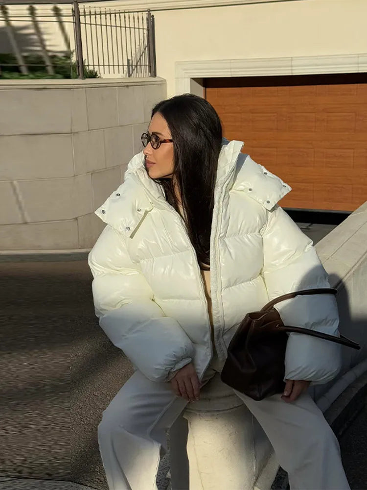 Moda com capuz recortado jaqueta acolchoada para mulheres casual sólido zíper bolso casaco de grandes dimensões senhora 2025 inverno rua quente outerwear