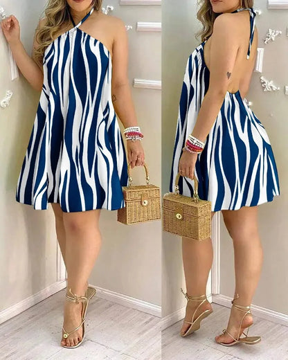 Vestido Boho com Estampa Floral e Decote Halter, Costas Nuas e Alças no Pescoço, Ideal para Primavera/Verão - Roupas Femininas
