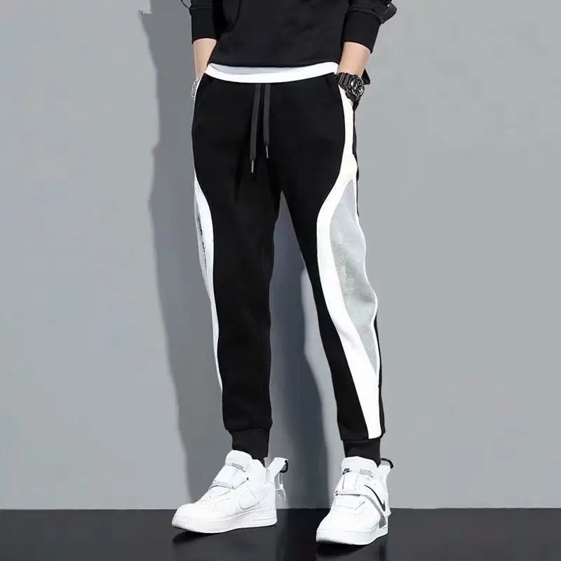 Calças esportivas masculinas para primavera e outono, leggings folgadas com detalhes em patchwork para corrida e treino, calças casuais da moda.