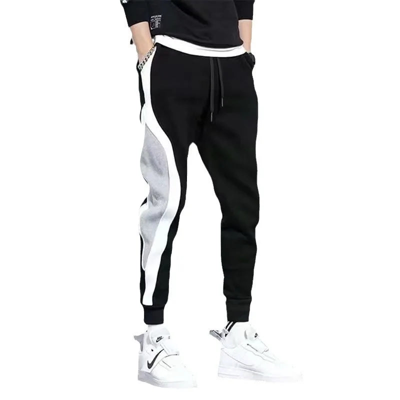 Calças esportivas masculinas para primavera e outono, leggings folgadas com detalhes em patchwork para corrida e treino, calças casuais da moda.