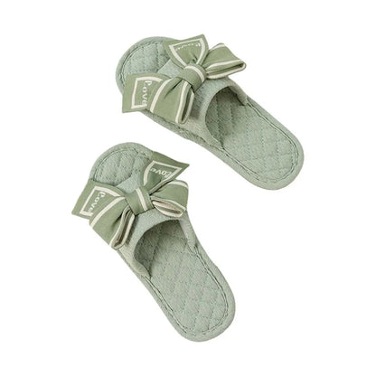 Chinelo de chão com laço Love Bow, plataforma plana e silenciosa, em tecido macio, para uso interno, ideal para mulheres.