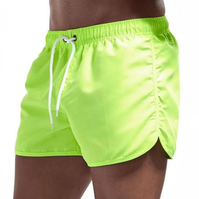 Calções de banho masculinos para o verão, calções de banho de marca, calções de banho sensuais, fatos de banho masculinos de cintura baixa e respiráveis para a praia.