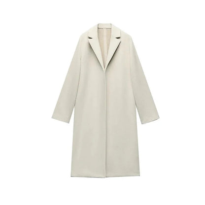 Casaco feminino de lã, modelo trench coat longo, liso, com costura aberta, decote em V vintage e mangas compridas. Ideal para um look feminino elegante.