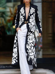 Casaco longo feminino com estampa floral, gola entalhada, mangas compridas, fecho de fivela, modelagem ampla, estilo blazer, elegante, ideal para o dia a dia.