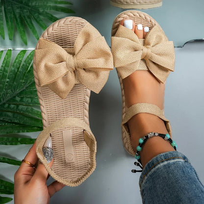 Sandálias femininas antiderrapantes da moda, leves e estilosas para o verão, ideais para praia, uso casual, com laço e design rasteiro.