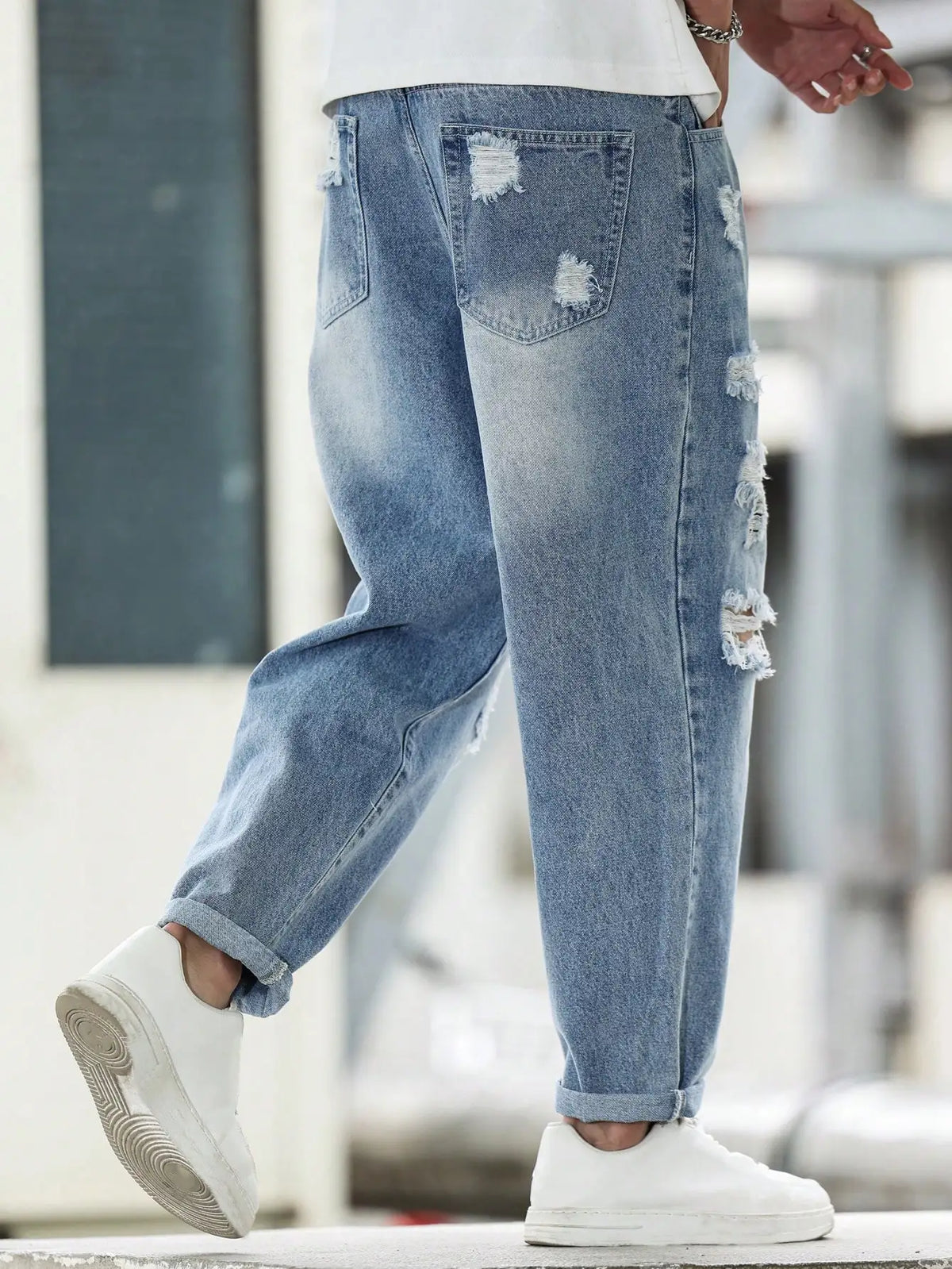 Calça Harém jeans rasgada azul masculina para primavera e outono. Moda de rua. Tendência Casual 。
