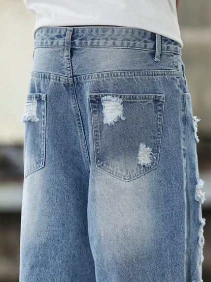 Calça Harém jeans rasgada azul masculina para primavera e outono. Moda de rua. Tendência Casual 。
